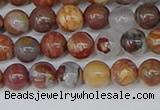 CAA1221 15.5 inches 6mm round gold mountain agate beads