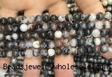 CAA3591 15.5 inches 4mm round black zebra agate beads wholesale