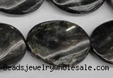 CAE110 15.5 inches 22*30mm twisted oval astrophyllite beads wholesale