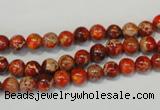 CDT491 15.5 inches 6mm round dyed aqua terra jasper beads