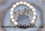 CFB910 9mm - 10mm rice white freshwater pearl & dogtooth amethyst stretchy bracelet