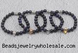 CGB6030 8mm round purple tiger eye bracelet with skull for men