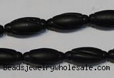 CNE15 15.5 inches 9*20mm carved rice black stone needle beads wholesale