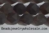 CSQ533 15.5 inches 10mm faceted nuggets matte smoky quartz beads