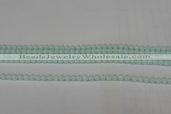 CTU2563 15.5 inches 4mm round synthetic turquoise beads