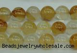 CYC103 15.5 inches 10mm round yellow crystal quartz beads