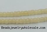 CYJ63 15.5 inches 6*7mm vase-shaped yellow jade gemstone beads wholesale